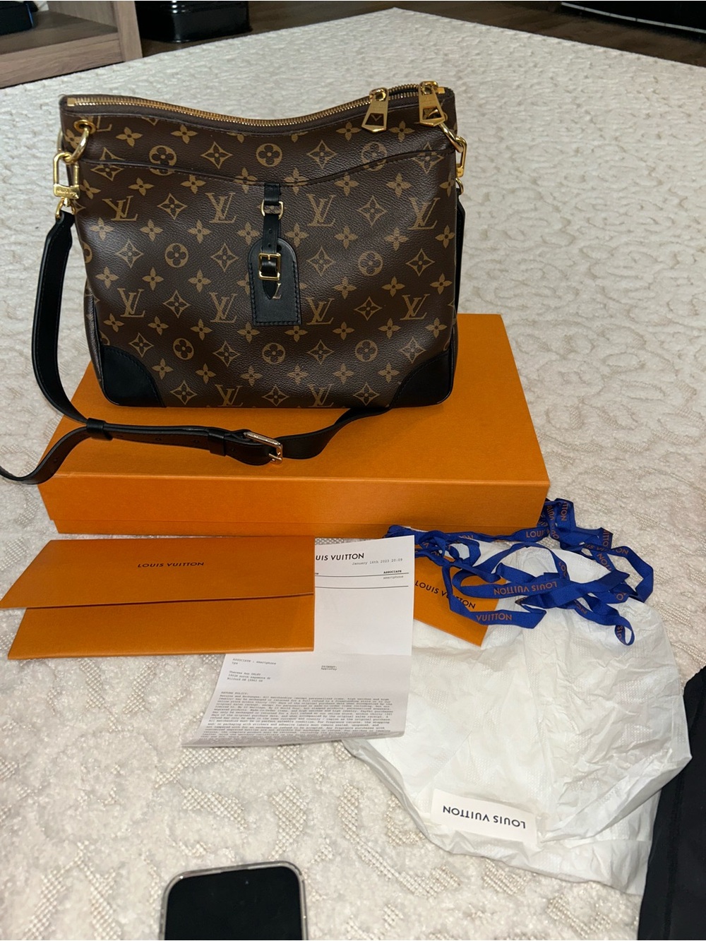 Louis Vuitton authentic Monogram Oden MM  Shoulder Bag with Black Trim